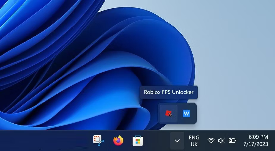Roblox FPS Unlocker red lock icon in the Windows 11 system tray